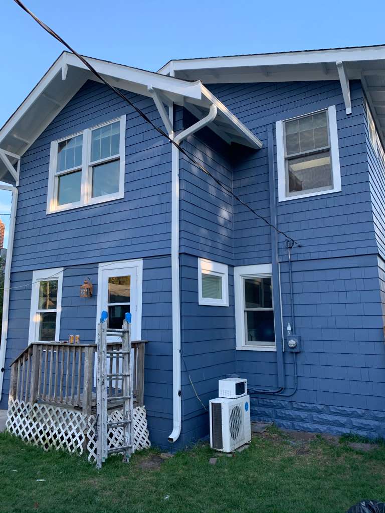 Blue house exterior after painting